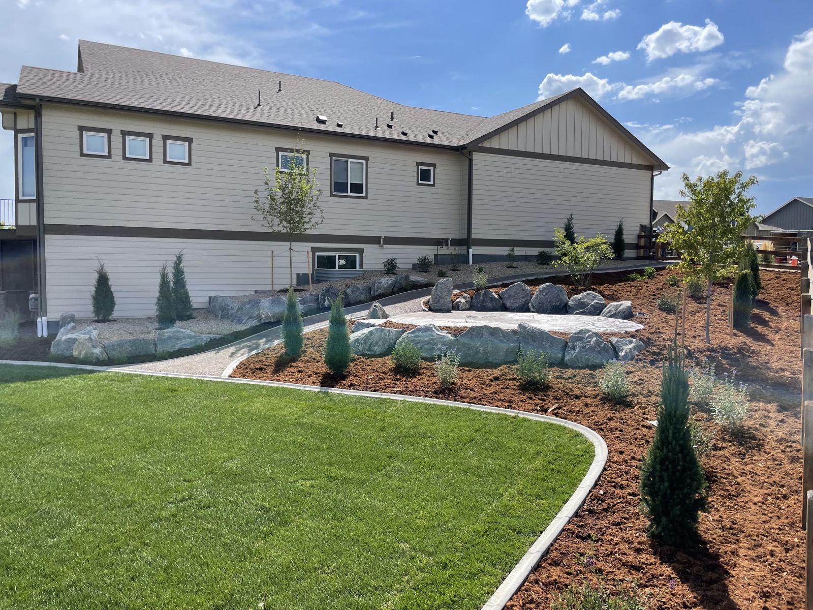 Natural Boulder Landscape with Sod Installation
